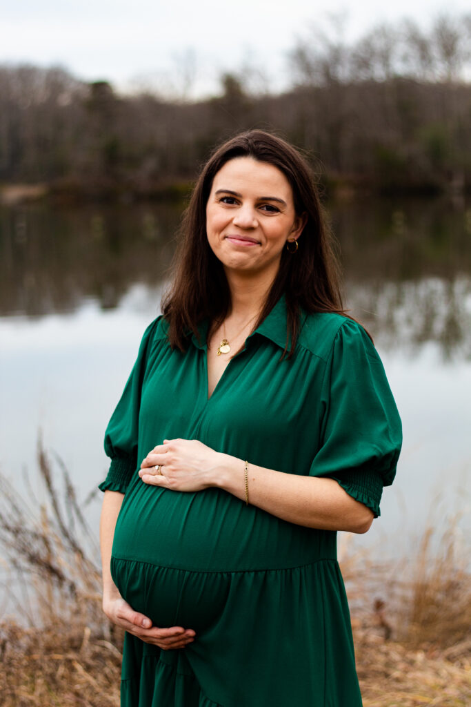 Maternity Portraits of mom holding her belly 